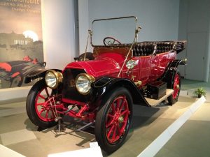 Old red Cadillac in a museum from 1912.